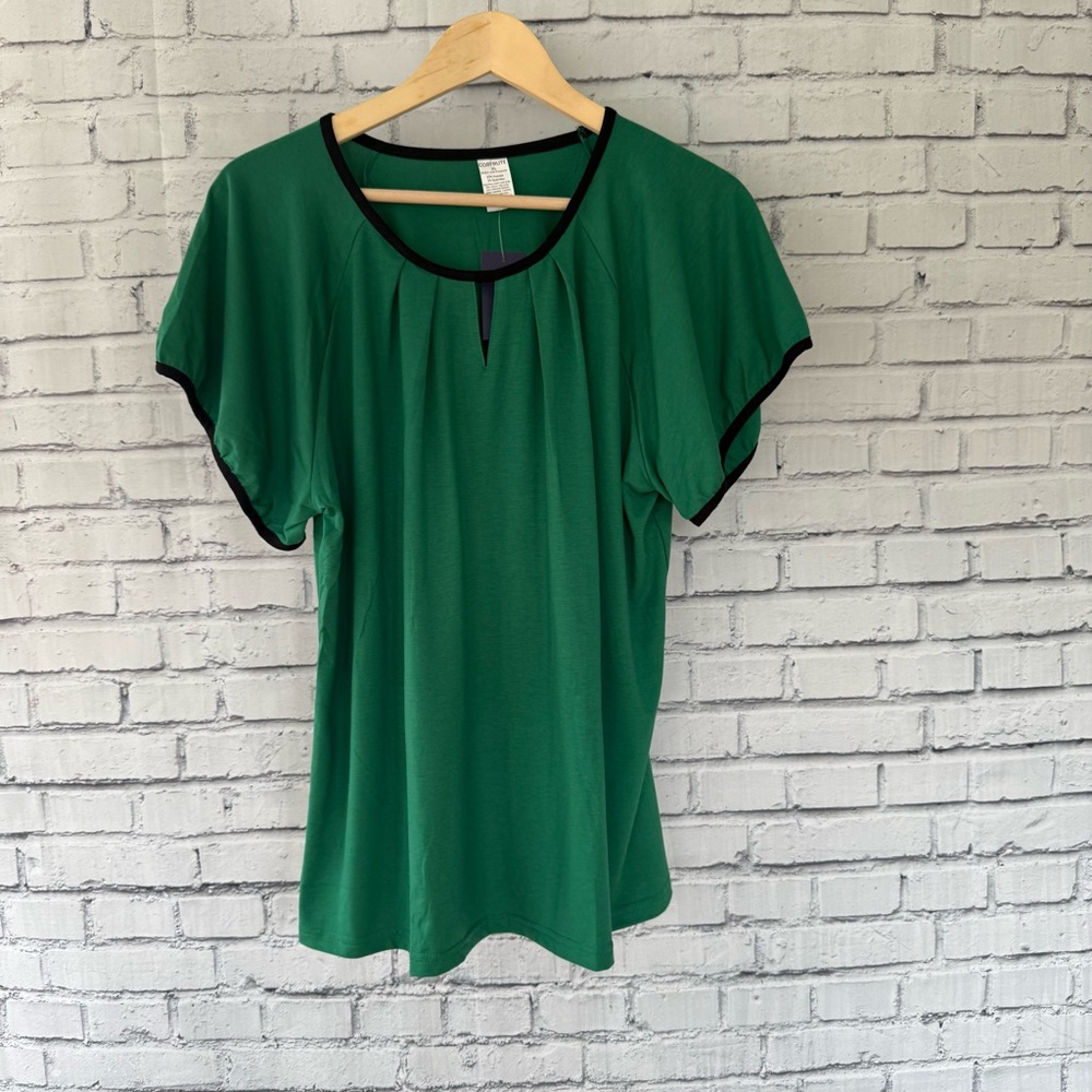Elegant Green Blouse with Black Accents‎